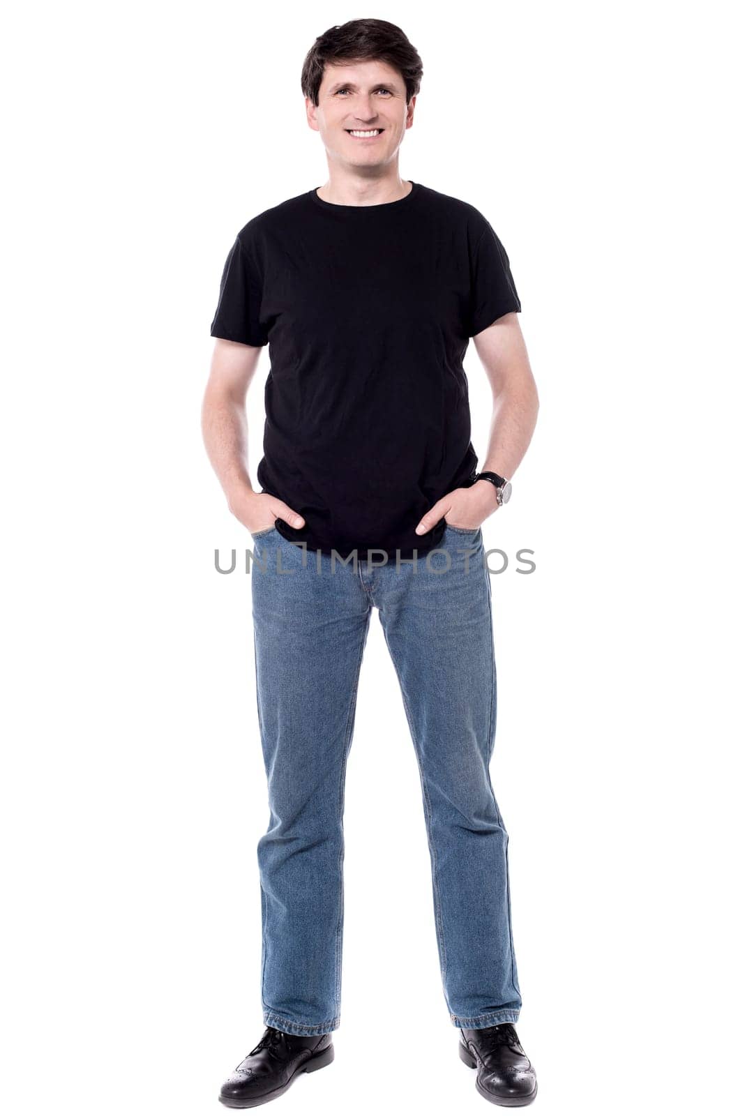 Happy man standing isolated on white background.