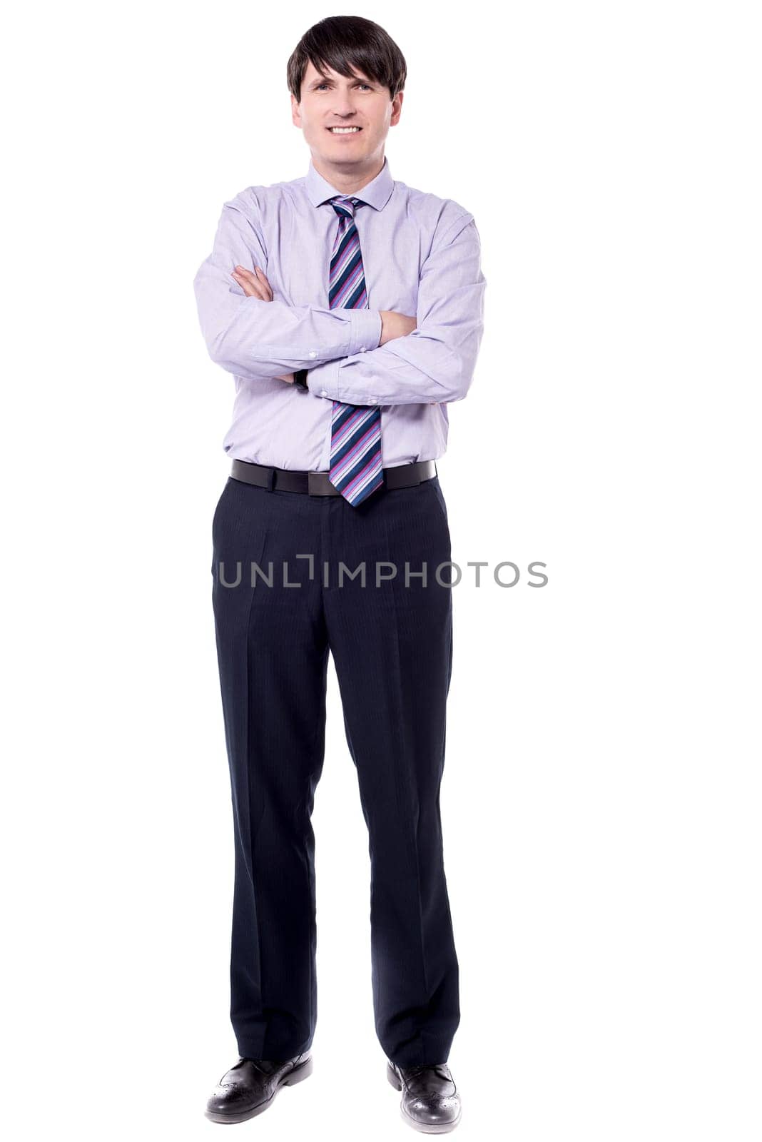 Confident business man with his arms crossed