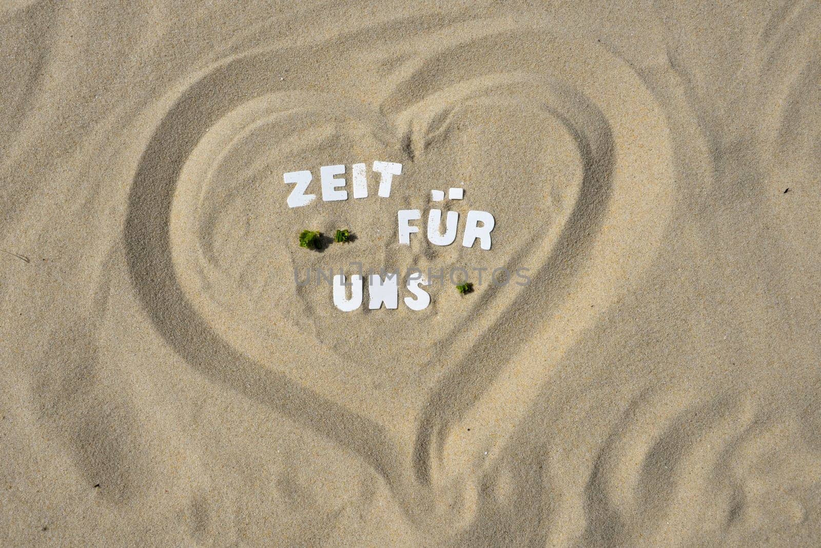 Time for me text in the sand