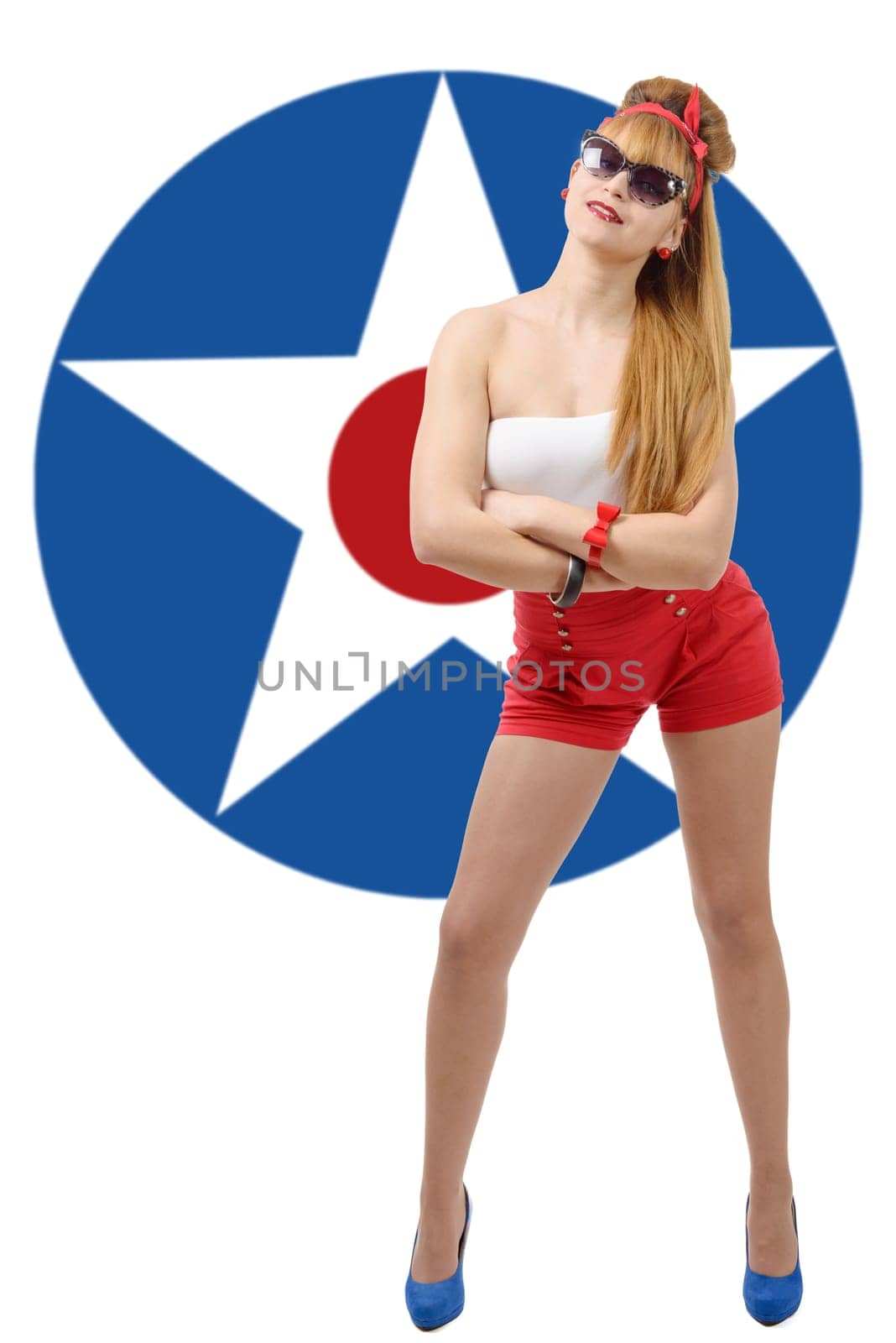 a pretty girl pin-up in shorts with american star on background