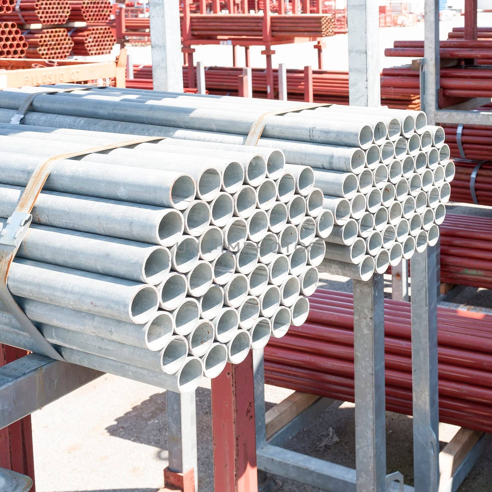 Steel Pipes bunch on the rack in warehouse