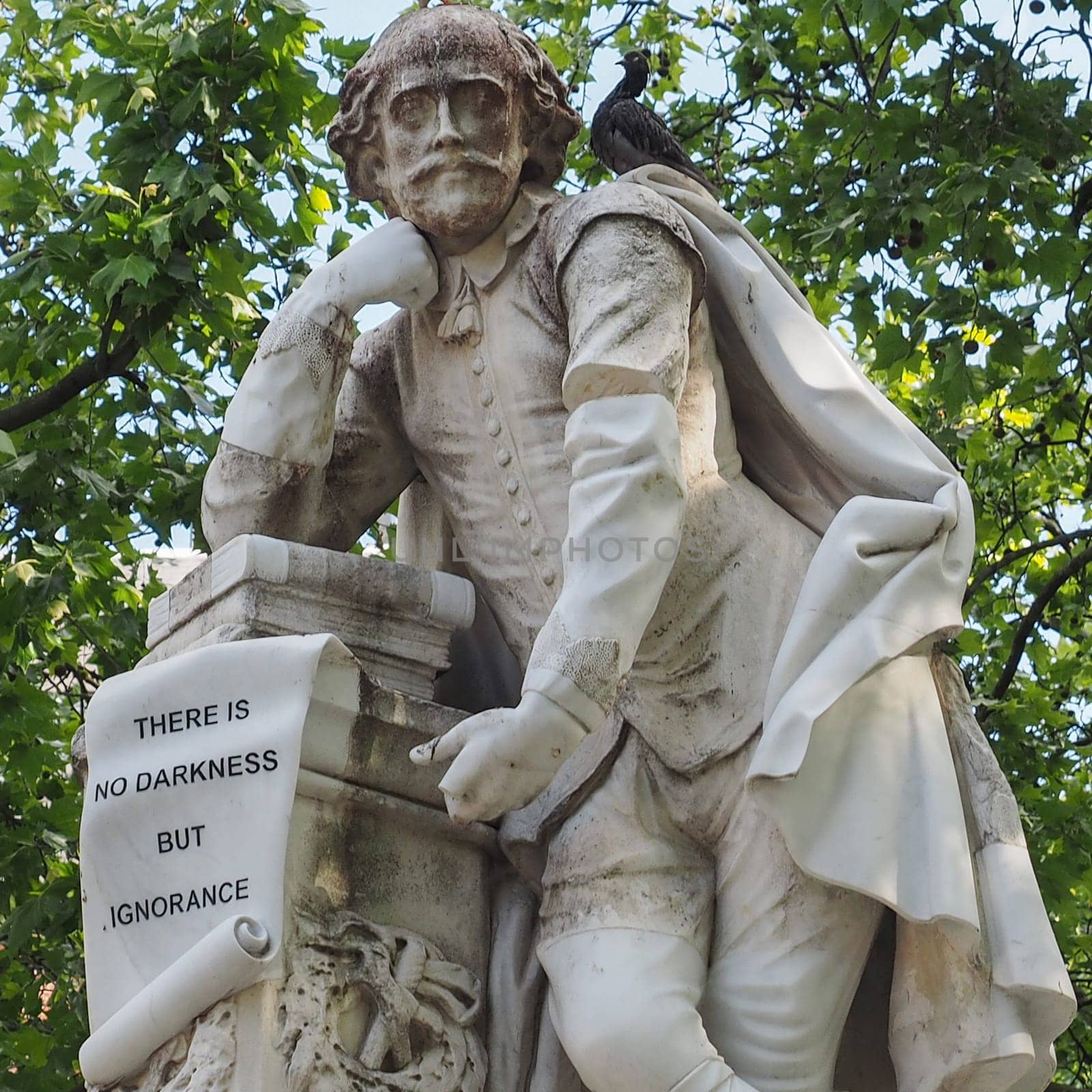 LONDON, UK - CIRCA JUNE 2015: Statue of William Shakespeare built in 1874 in Leicester Square in London