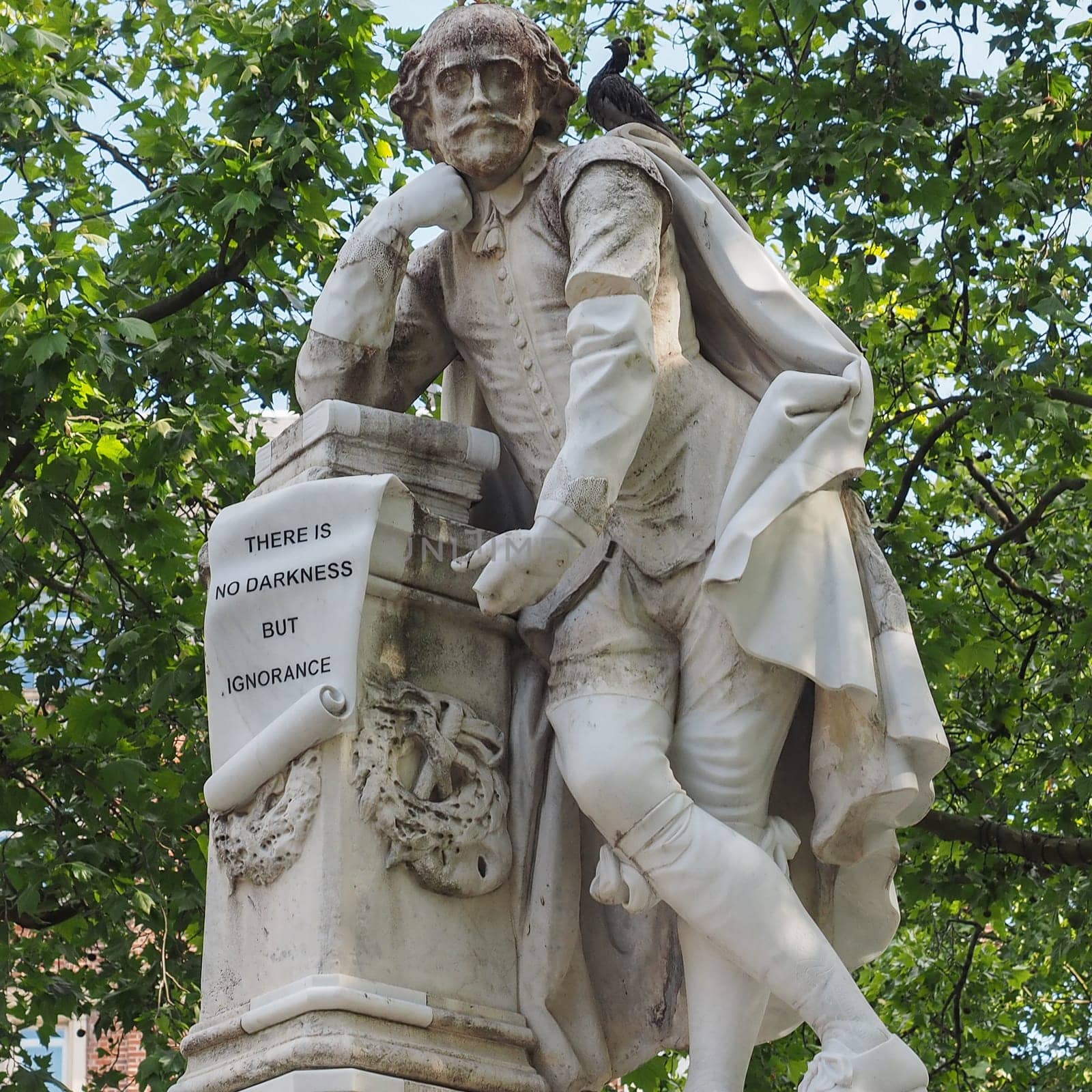 LONDON, UK - CIRCA JUNE 2015: Statue of William Shakespeare built in 1874 in Leicester Square in London