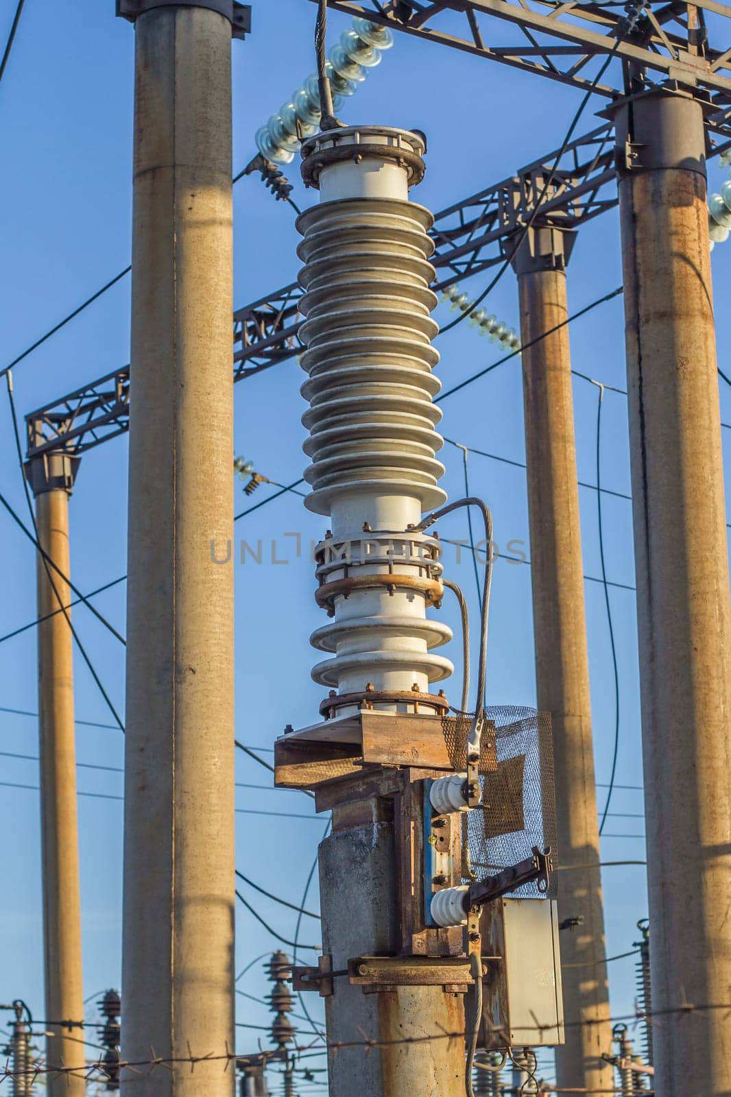 electric insulator on the background of blue sky
