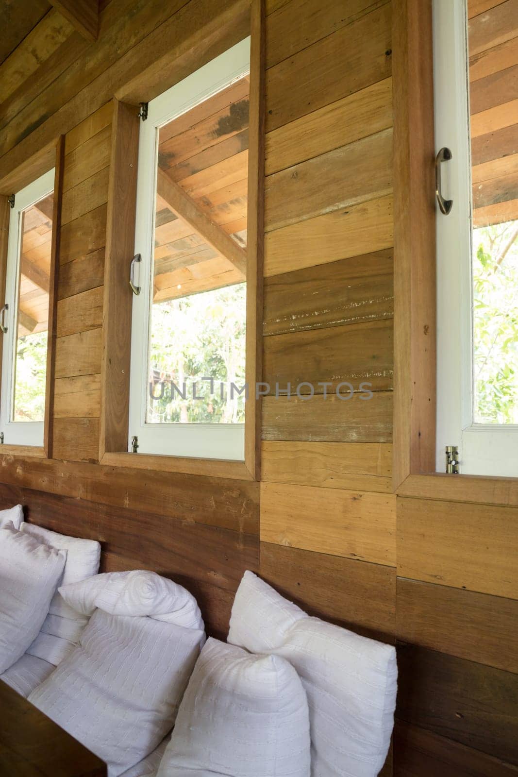 Wooden interior living room with window, stock photo