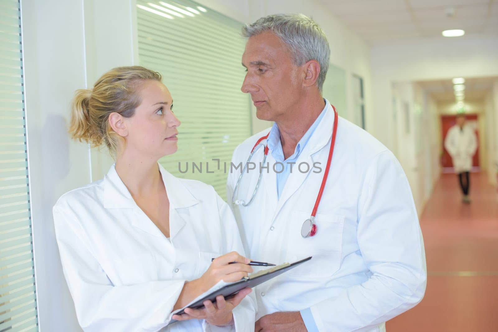 Two medics in discussion
