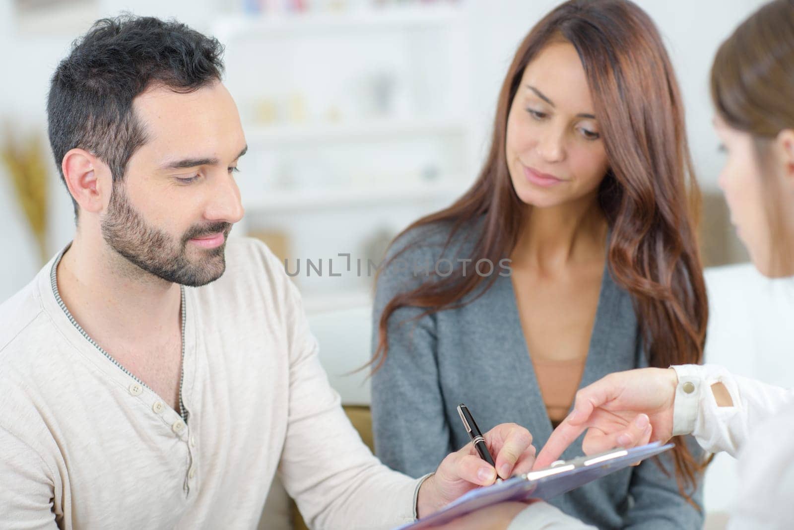 couple signing form