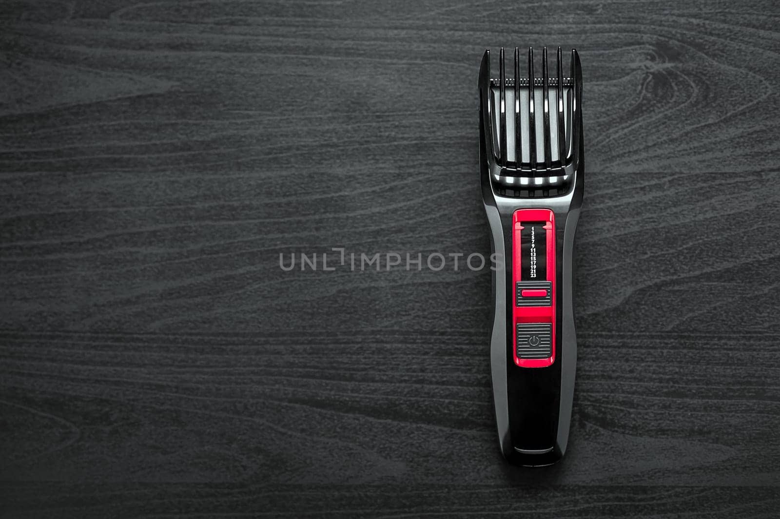 hair trimmer closeup on a black background