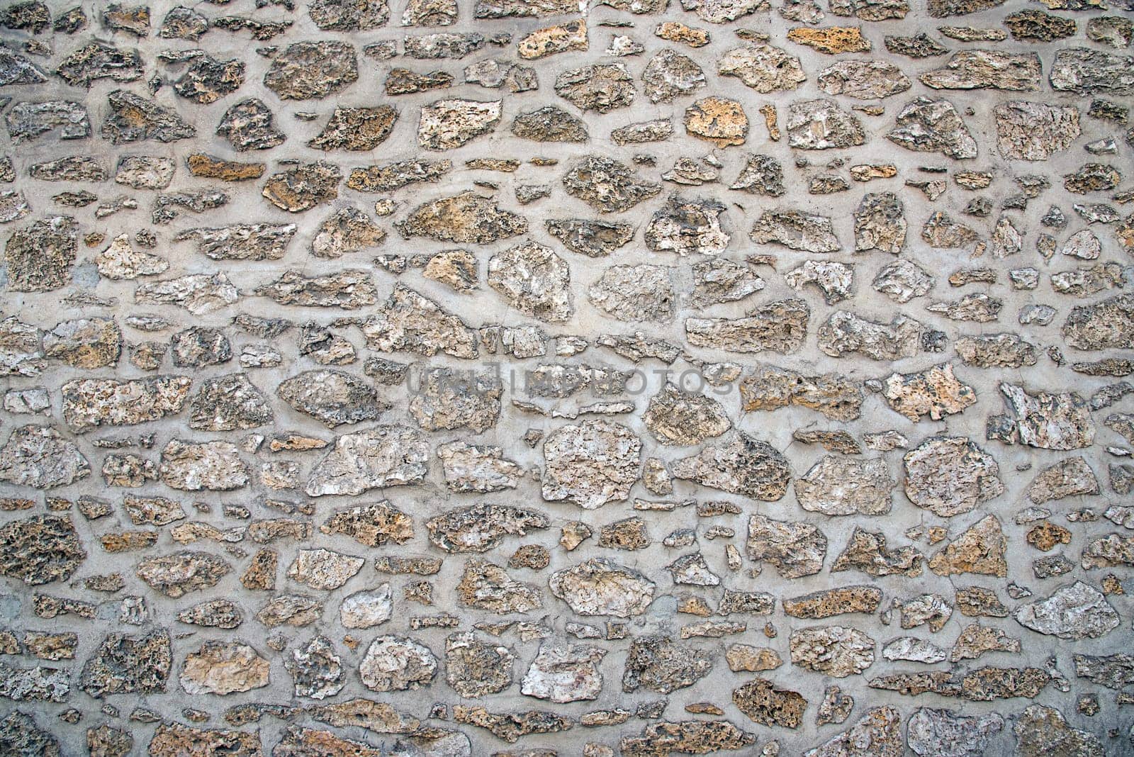 Background from an old natural stone wall