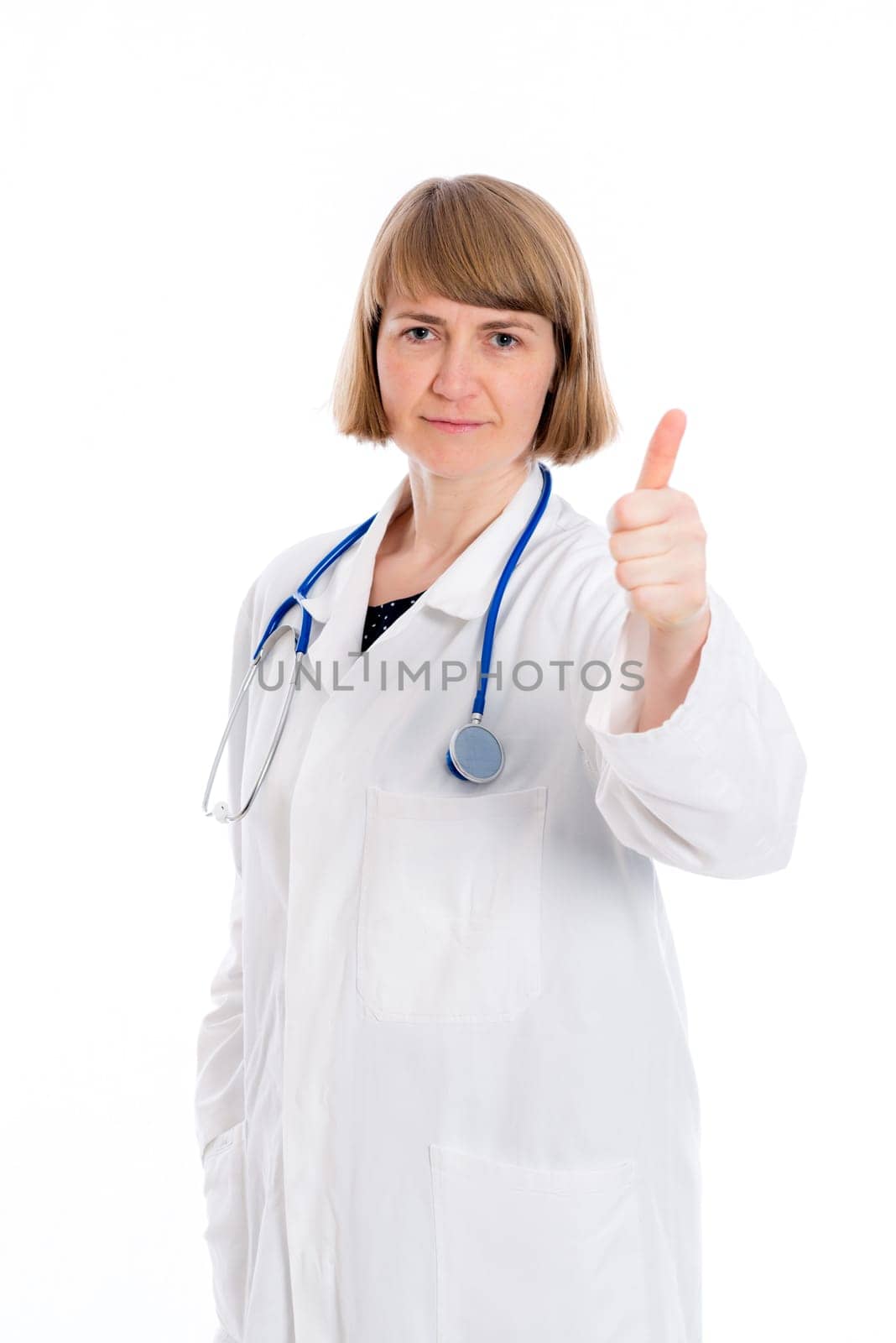 young female doctor with thumb up in front of white background