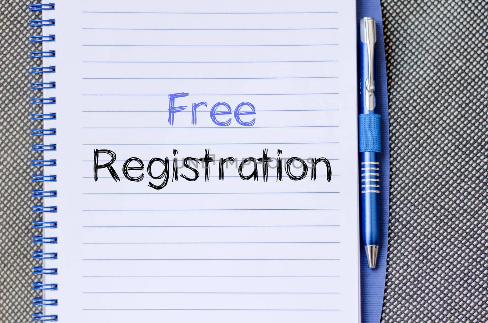 Free registration text concept write on notebook