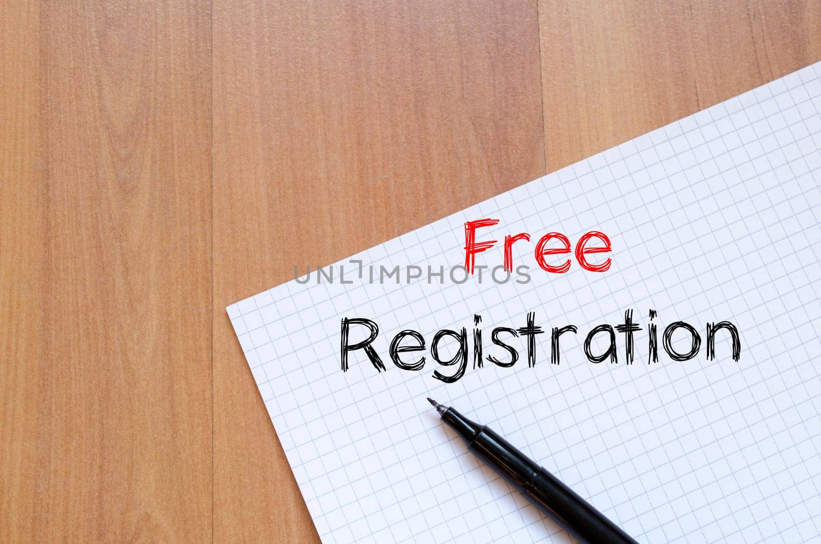 Free registration text concept write on notebook