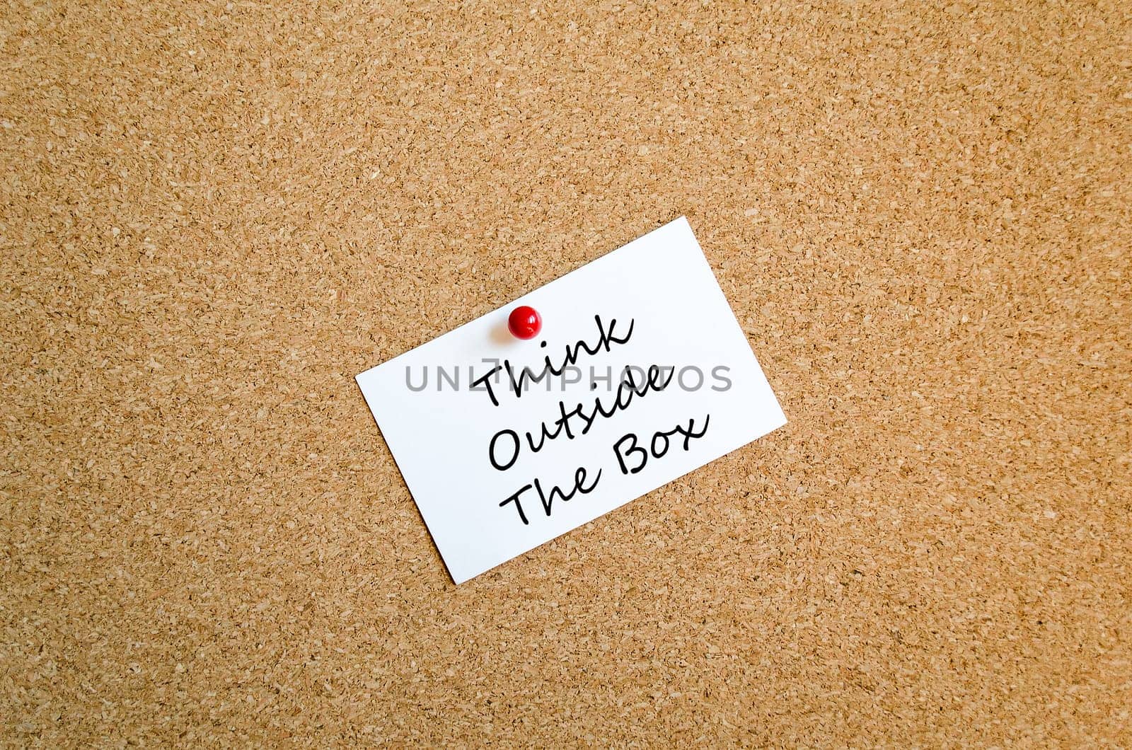 Sticky Note On Cork Board Background And Text Concept