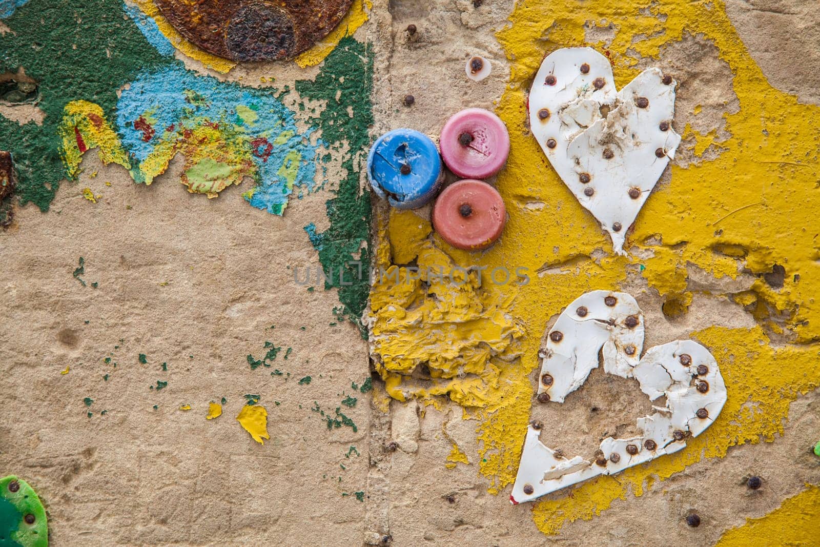 Hand painted wall with  bottle plugs and plastic made hearts