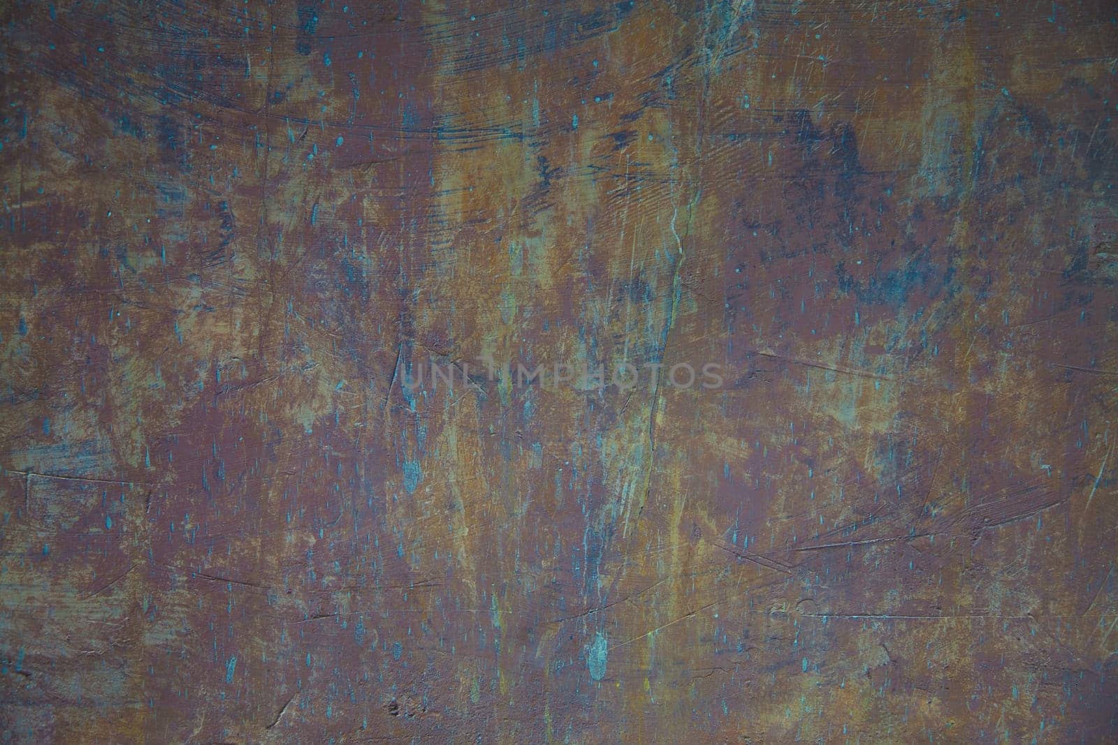 A old wall scratched in multi colors way