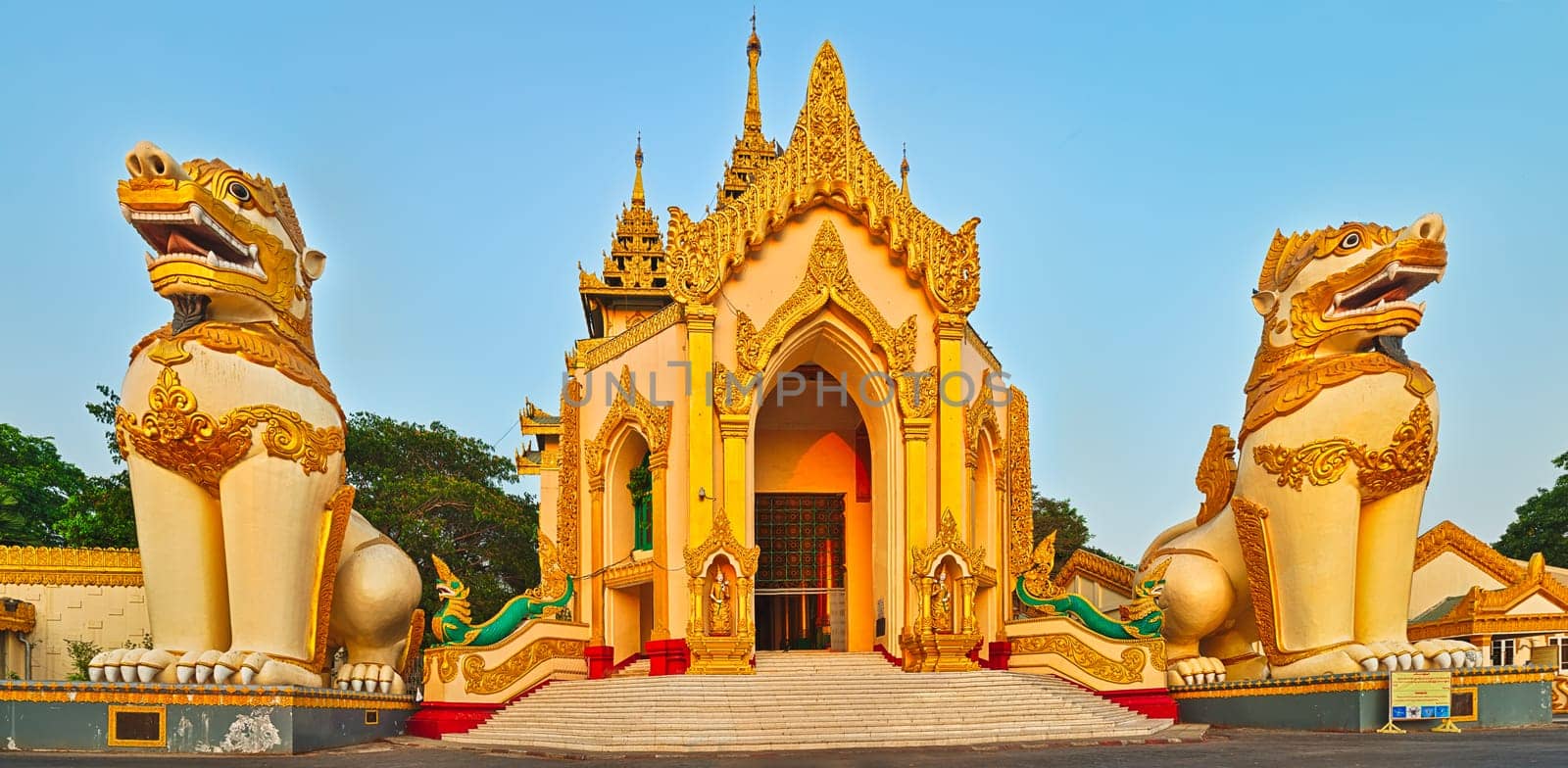 Western entrance of Shwedagon complex in Yangon. Myanmar. Panorama