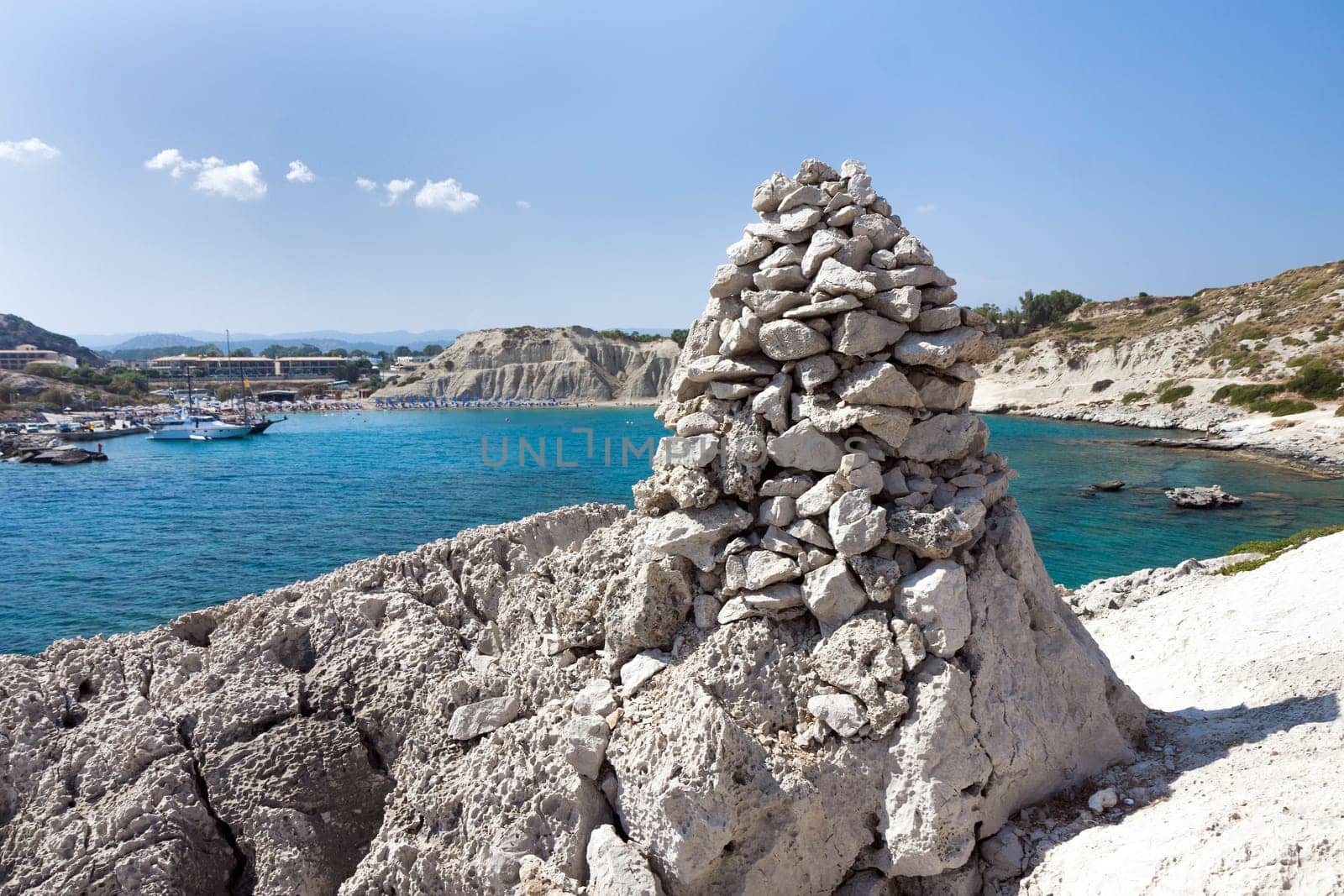 Kolymbia beach with the rocky coast in Greece.