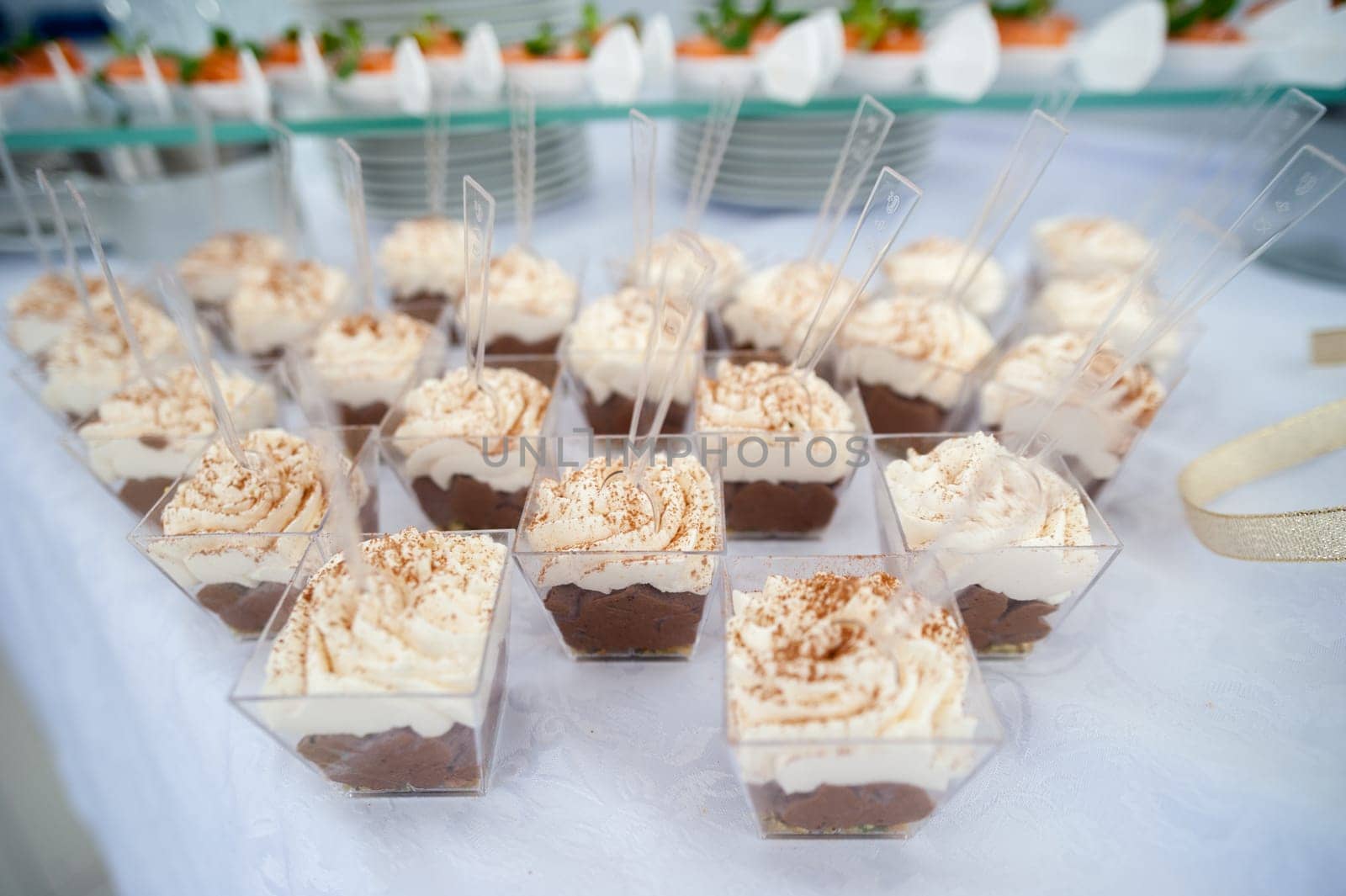 beautiful candy bar serving a festive table with cupcakes towers and sweet love sign