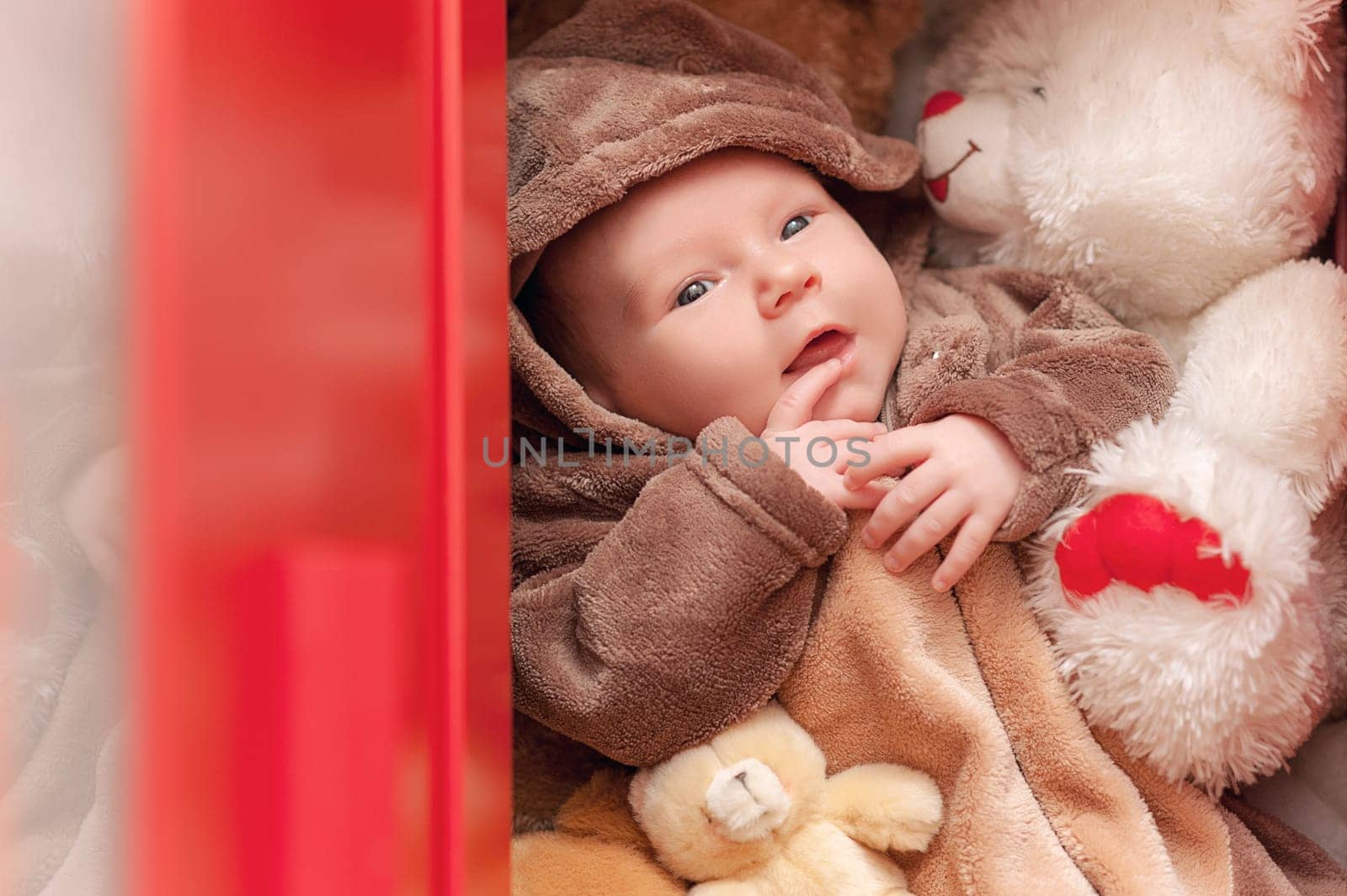 Baby sleeping with her teddy bear, new family and love concept Soft focus and blurry