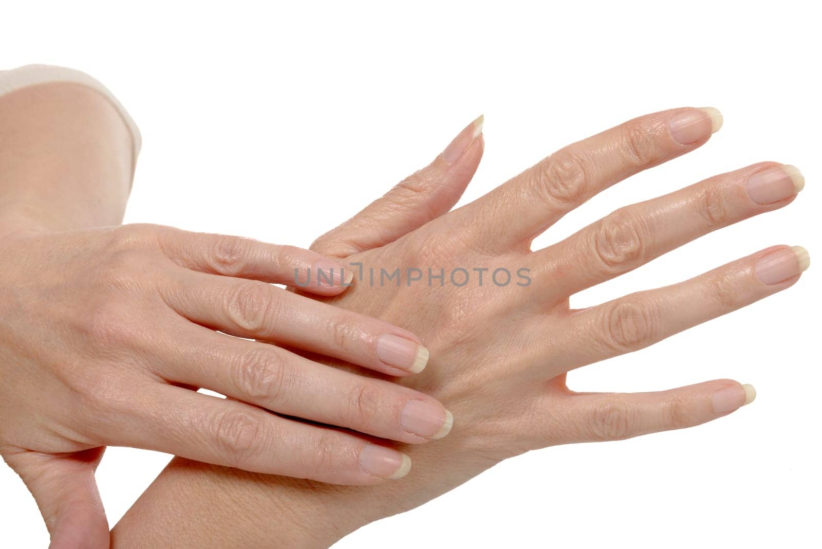 Beautiful woman hands  isolated on a white background