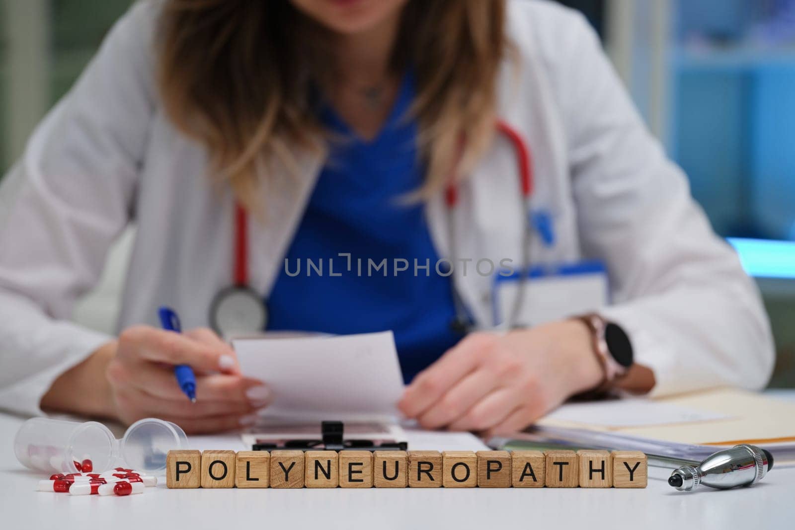 A qualified healthcare professional meticulously reviews notes on polyneuropathy within a clinical environment