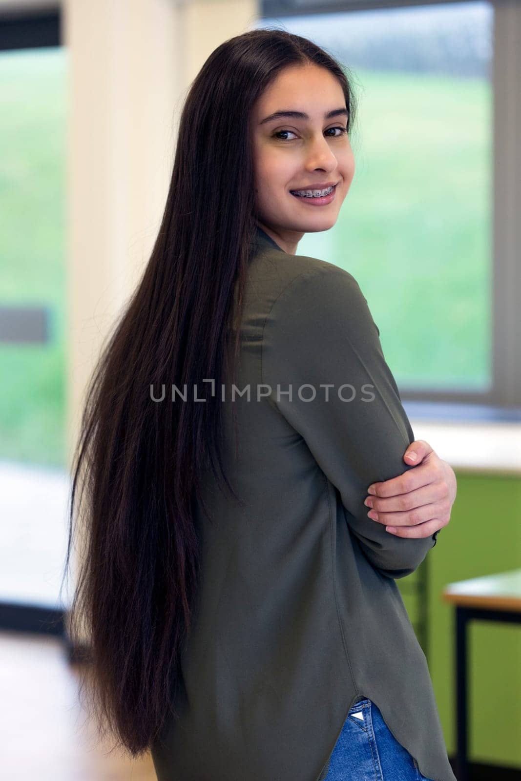 Portrait of a teenage girl at school.