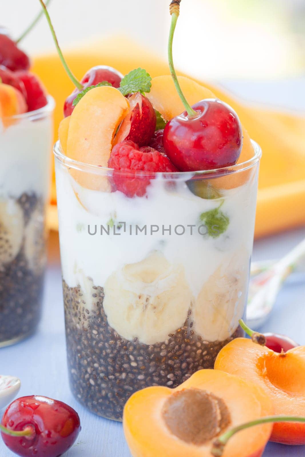 Chia pudding and yoghurt in the glass with fresh fruechten