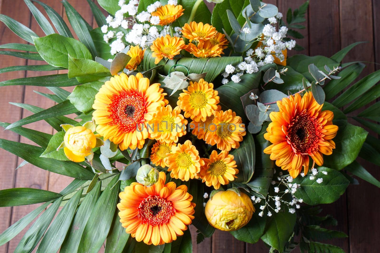 bouquet of orange flowers, perfect for Mothers day or birthdays. Peonies, Bridal Viels, green leaves and daisies