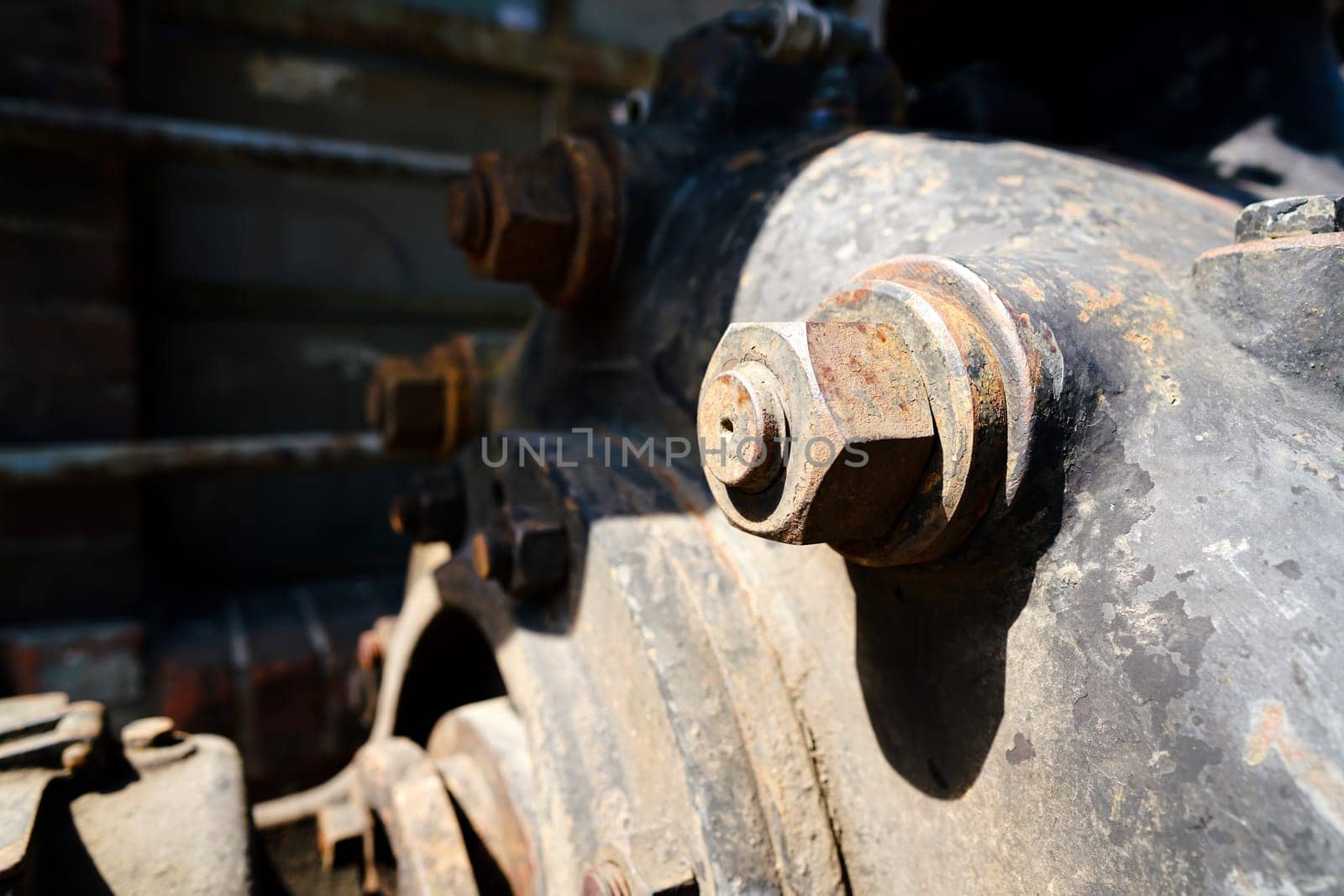 Screw with nut in an abandoned factory in Berlin