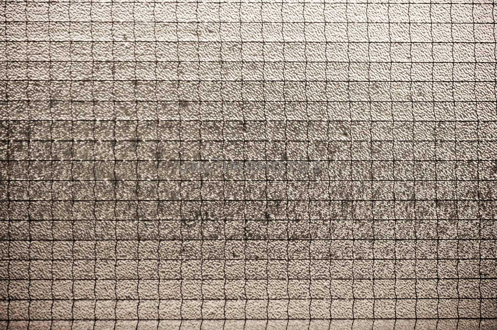 Old light brown glass vintage background, textured