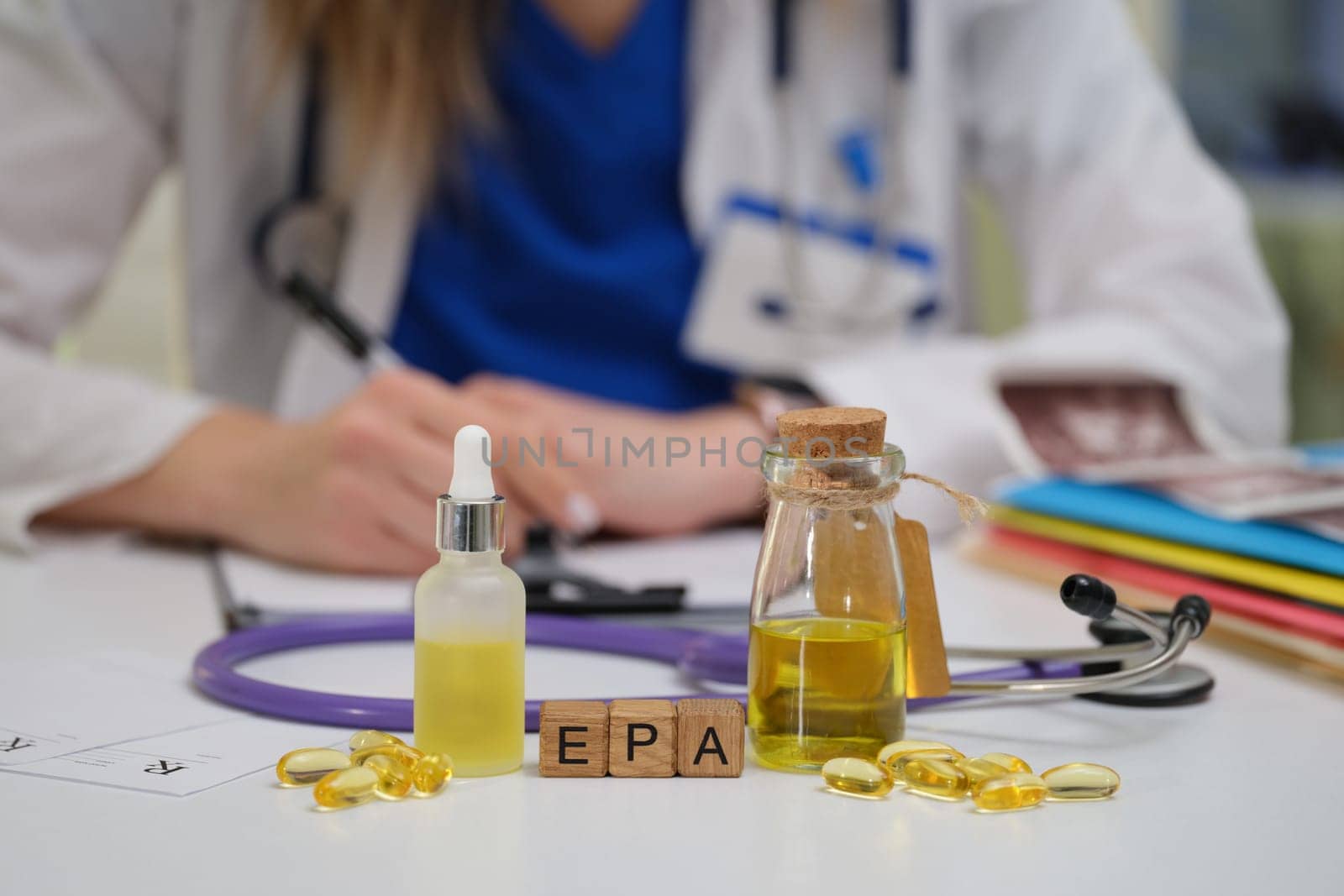 A healthcare professional rigorously examines various herbal oils and supplements for patient care and wellbeing