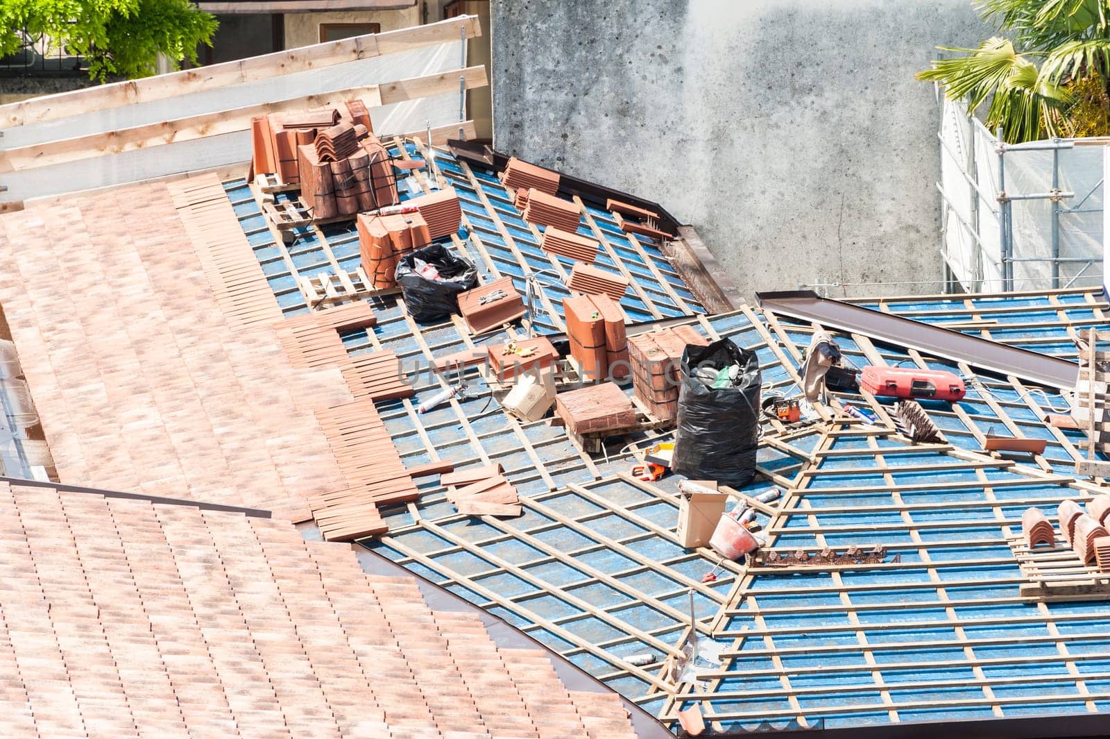 Construction site. Roof renovation. Pallets of shingles