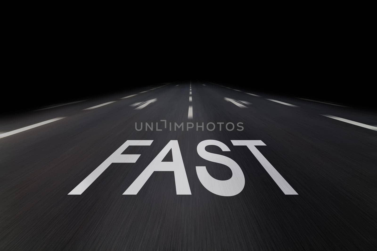 fast written on asphalt by night