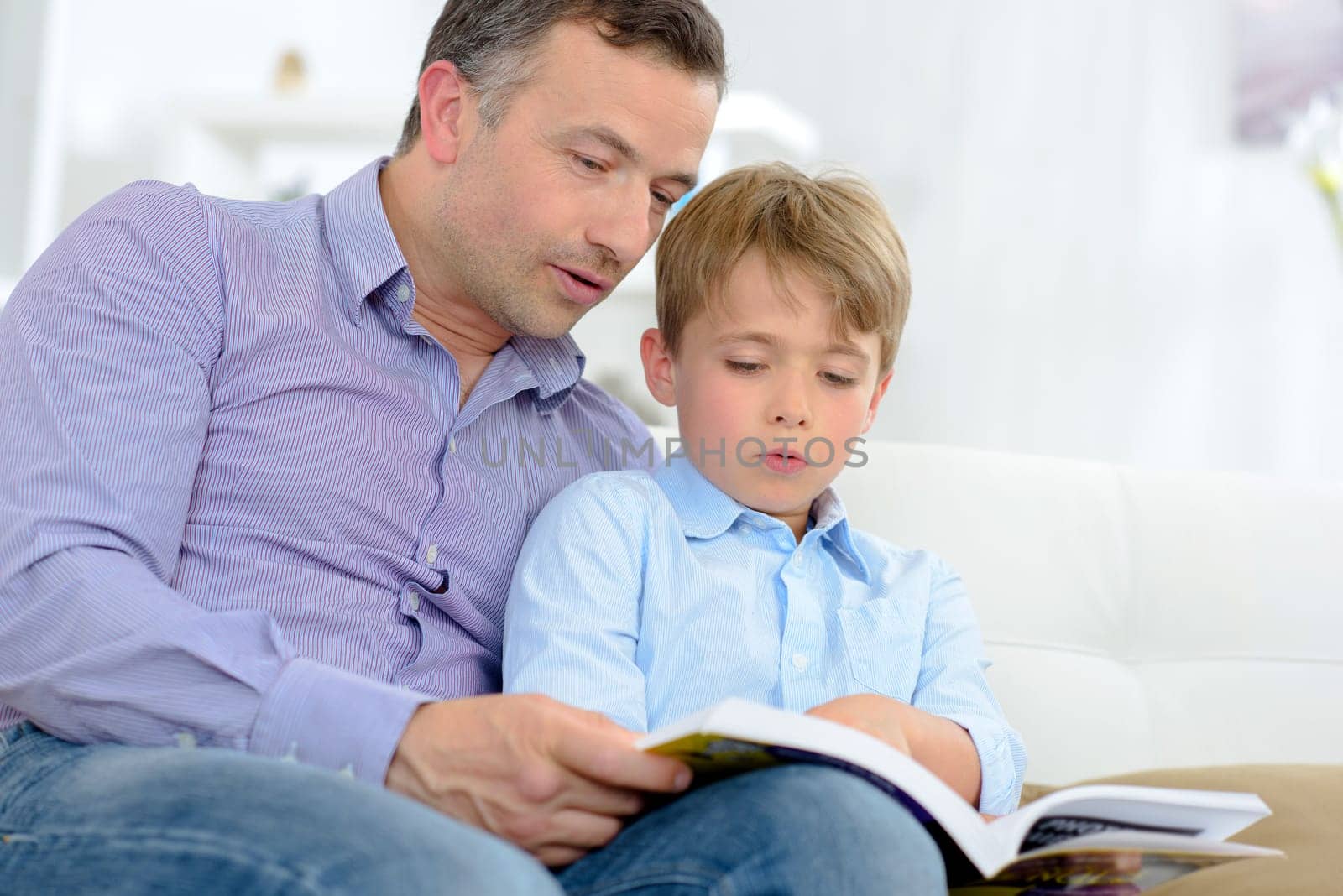 Adult and child reading