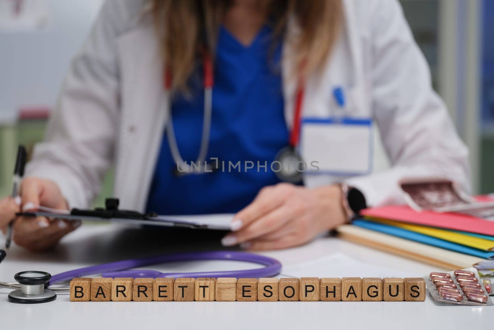 A medical doctor is discussing Barrett Esophagus with a patient in a professional clinical environment setting