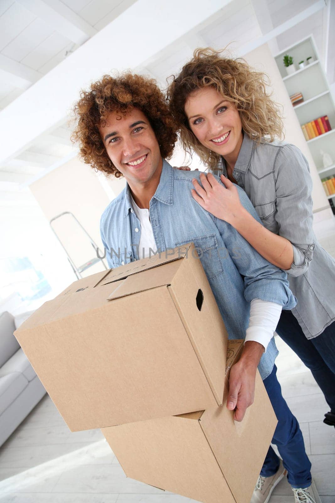 Couple moving in new apartment