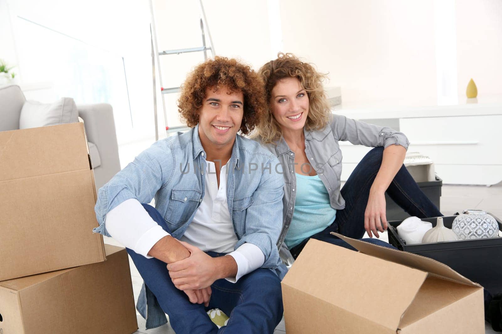 Couple getting in their new apartment to live together