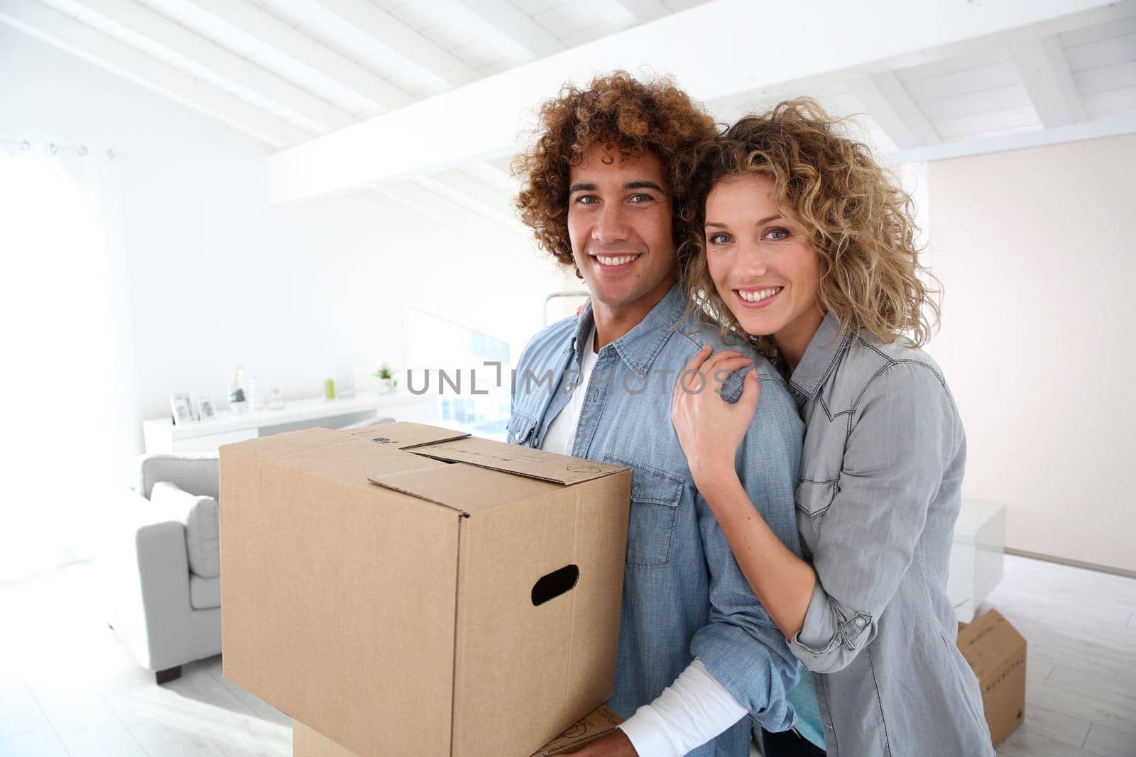 Couple moving in new apartment