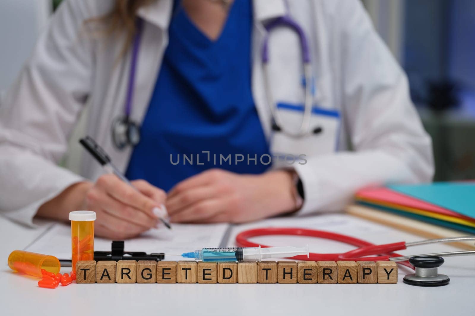 A healthcare provider meticulously documenting targeted therapy treatments while prioritizing patient care and support