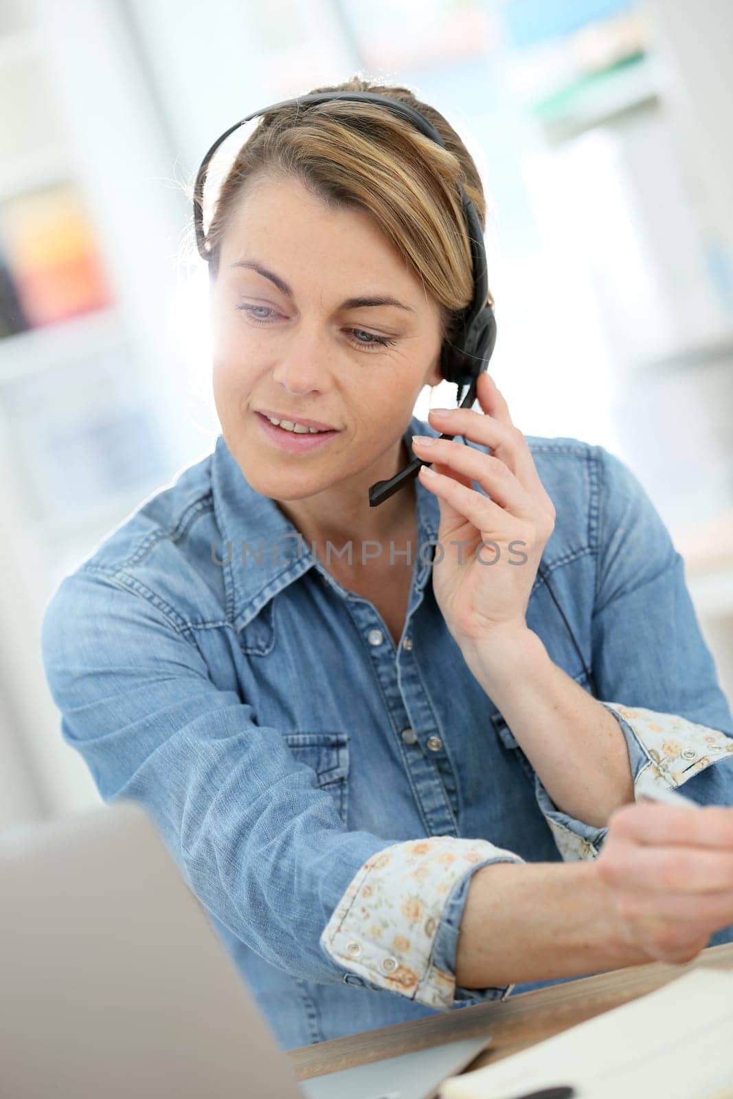 Active woman teleworking from home
