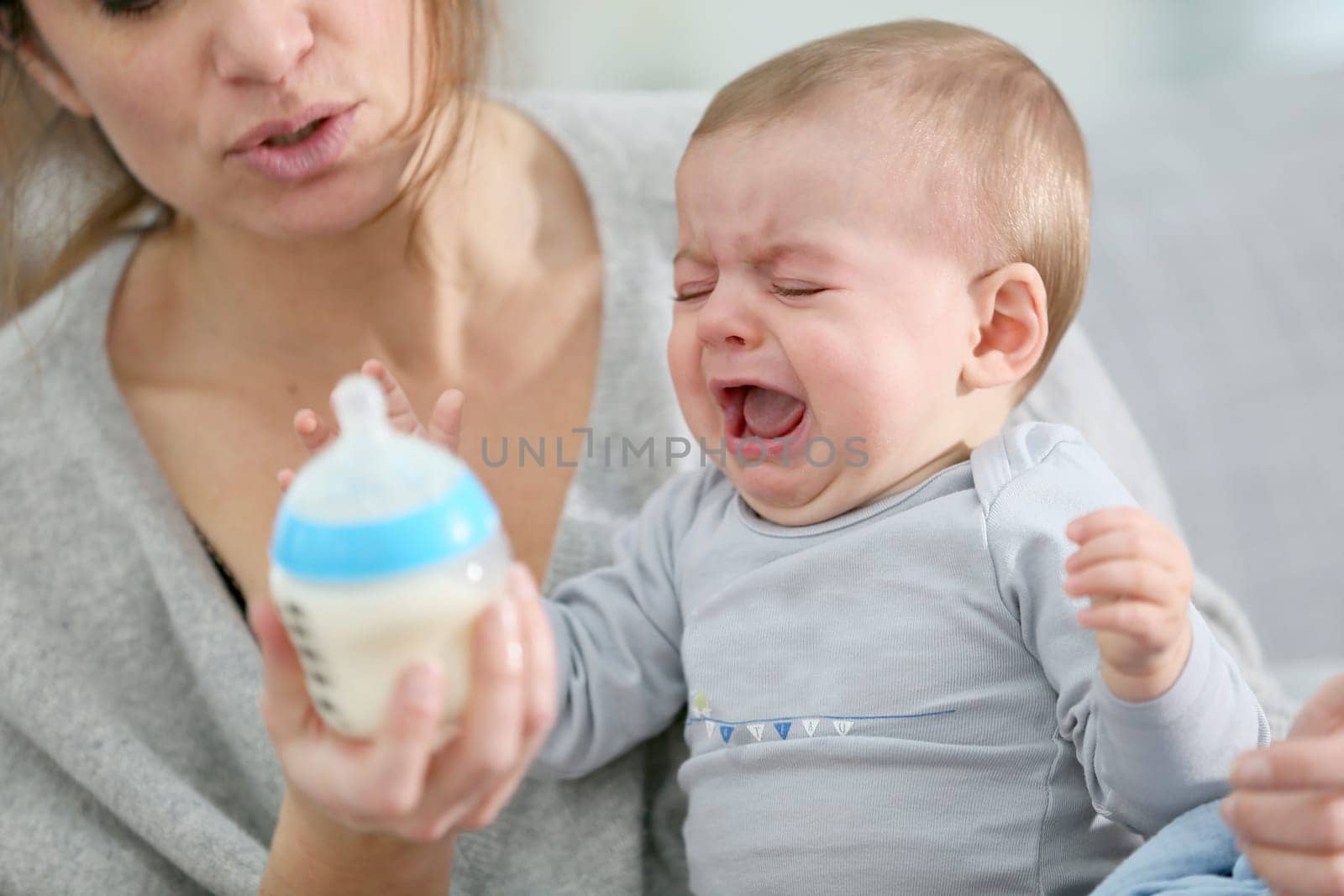 Baby boy crying to have food