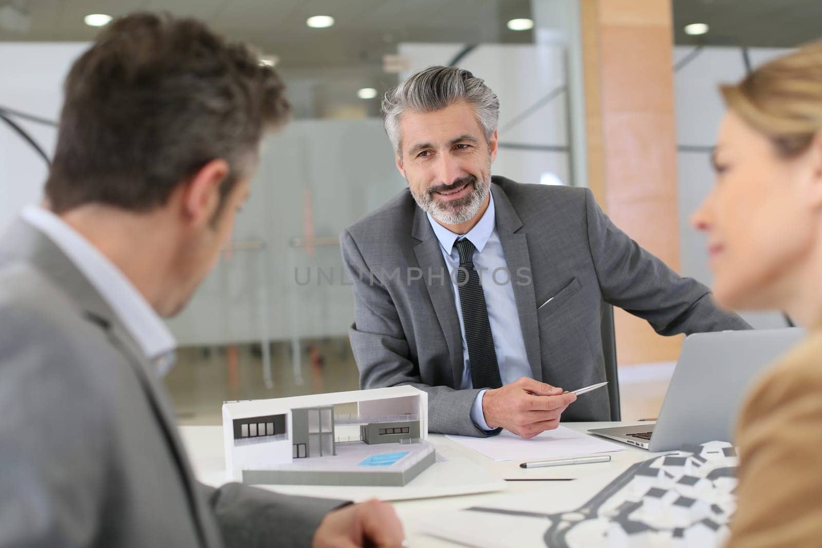 Architect meeting with clients in office