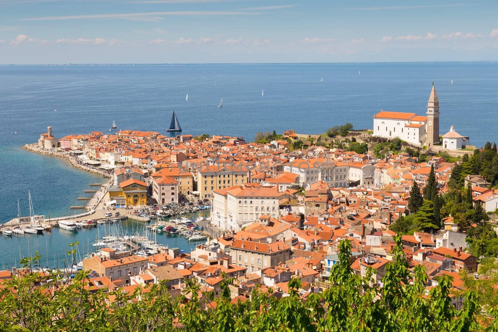 St. George&#39 s Parish Church in picturesque old town Piran - Slovenian adriatic coast.