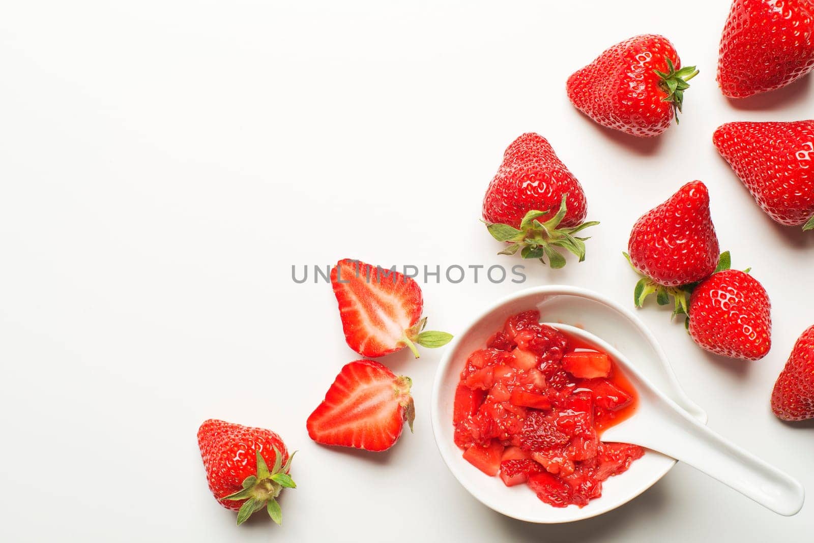 Fresh red Strawberries fruits on a white background.