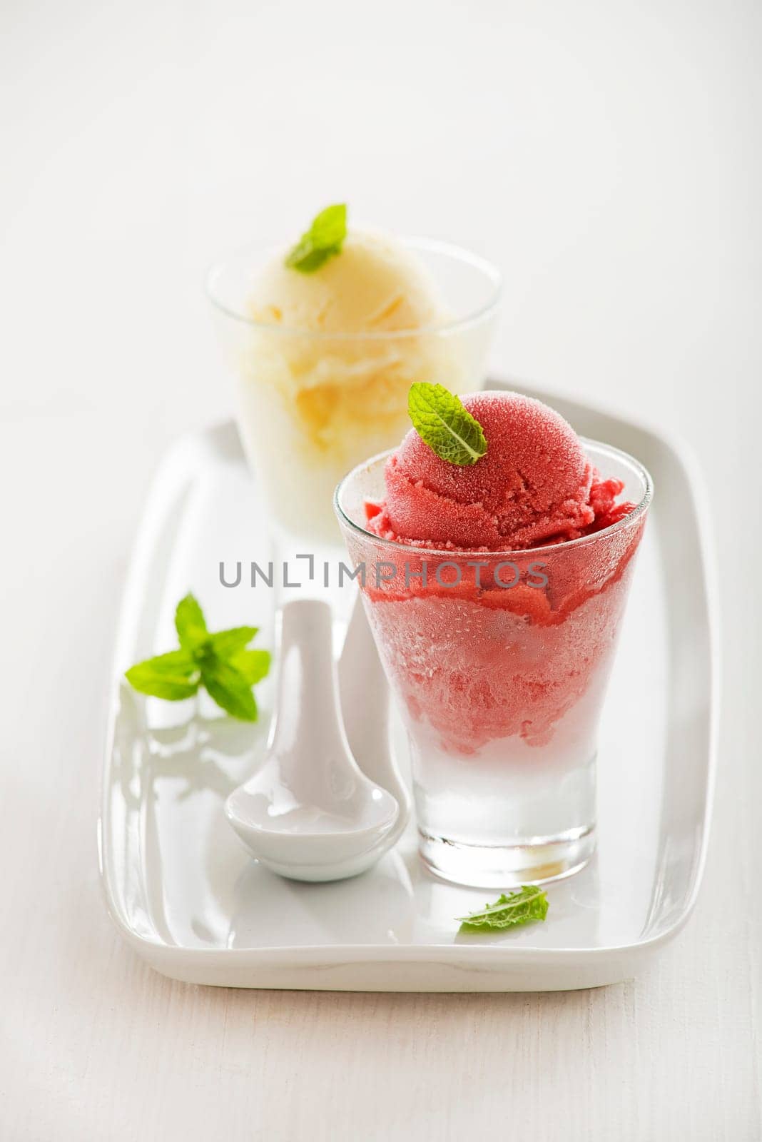 Fresh fruit sorbet ice cream on white background.