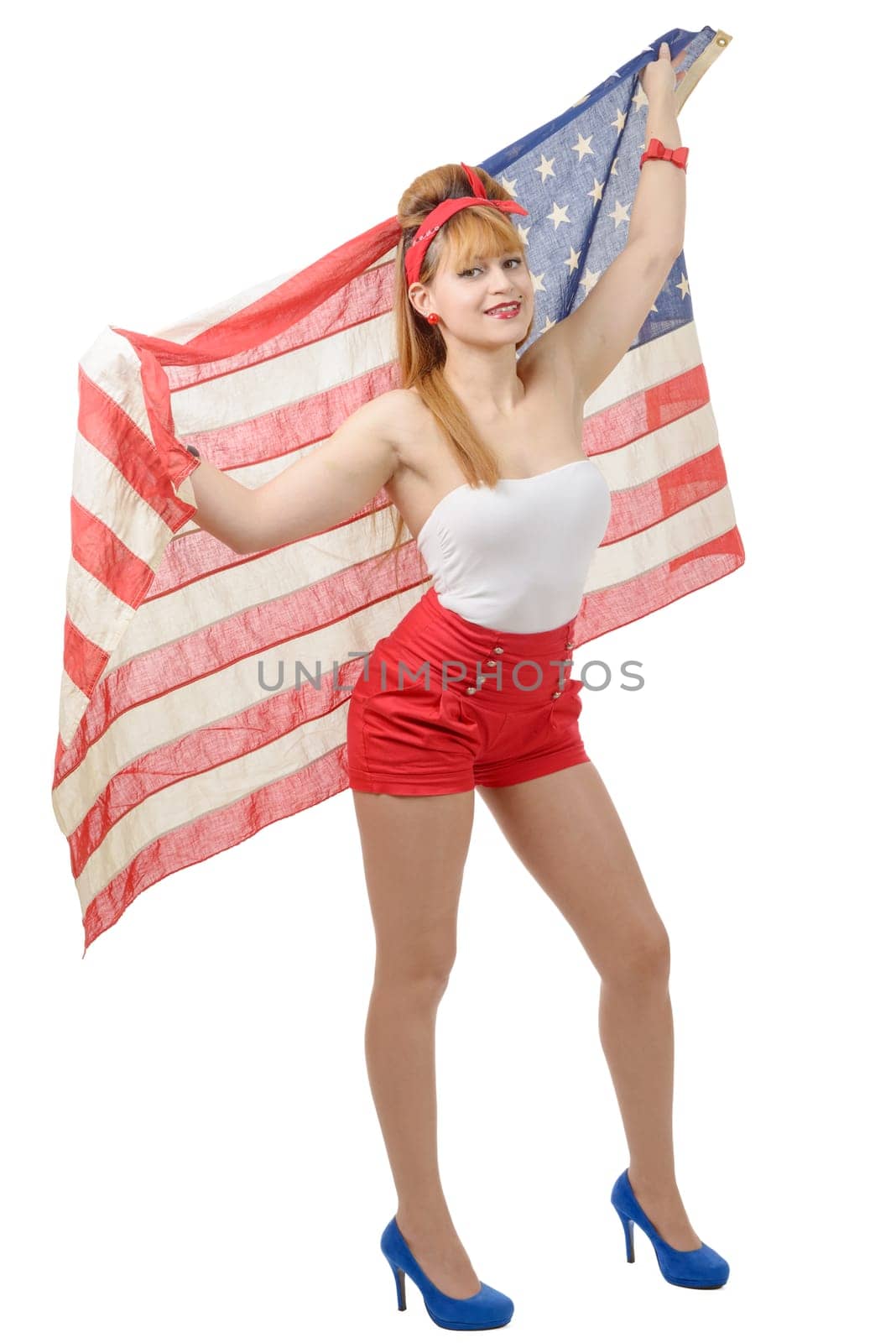 a sexy pin up girl isolated holding an American Flag