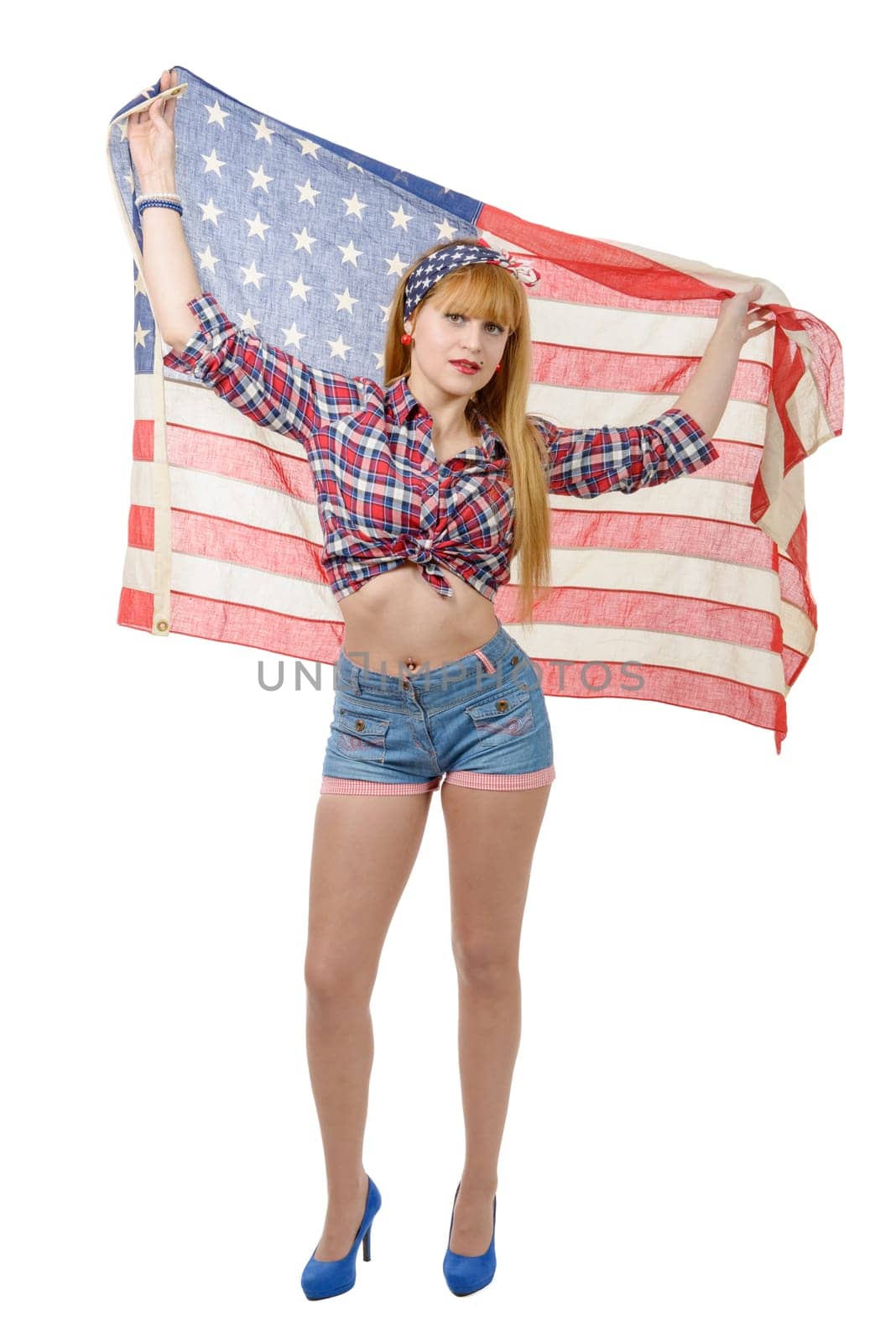 a sexy pin up girl isolated holding an American Flag