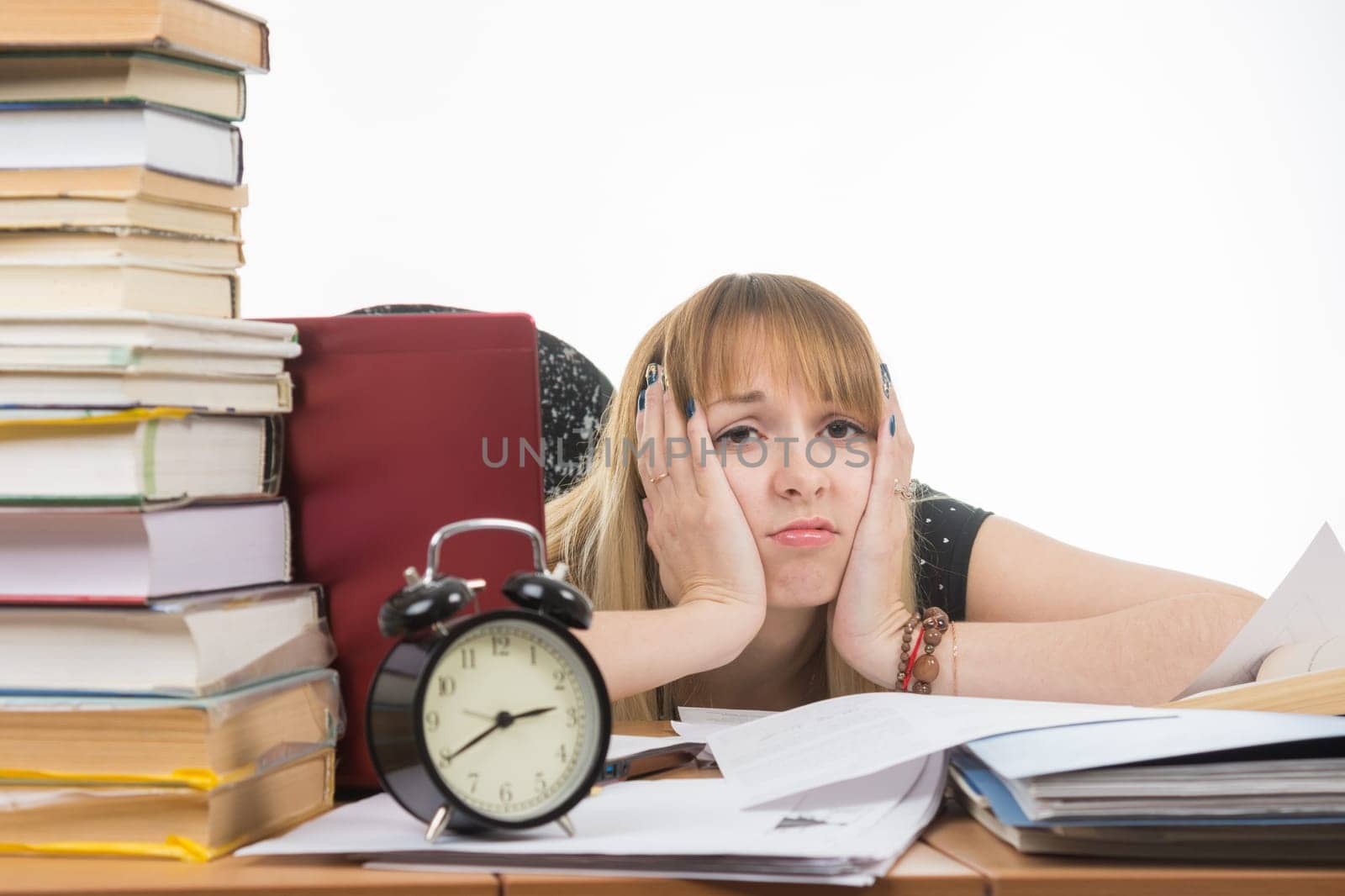 Student bored and tired of doing the preparation for exams