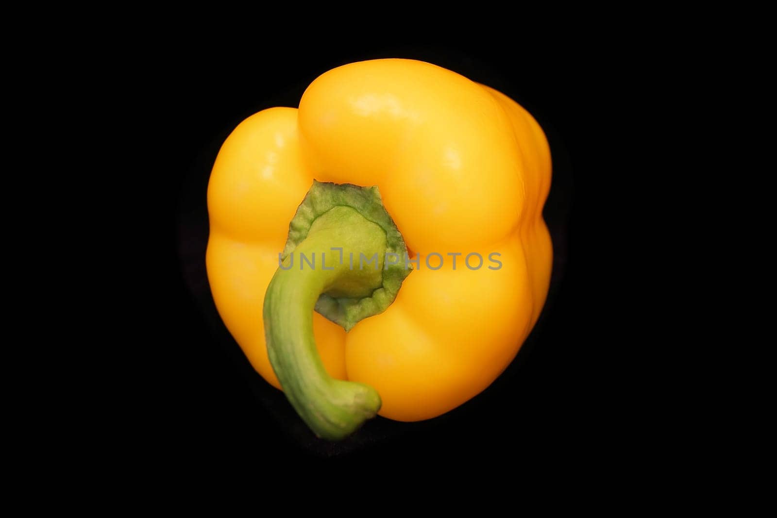 Image of raw peppers on black background