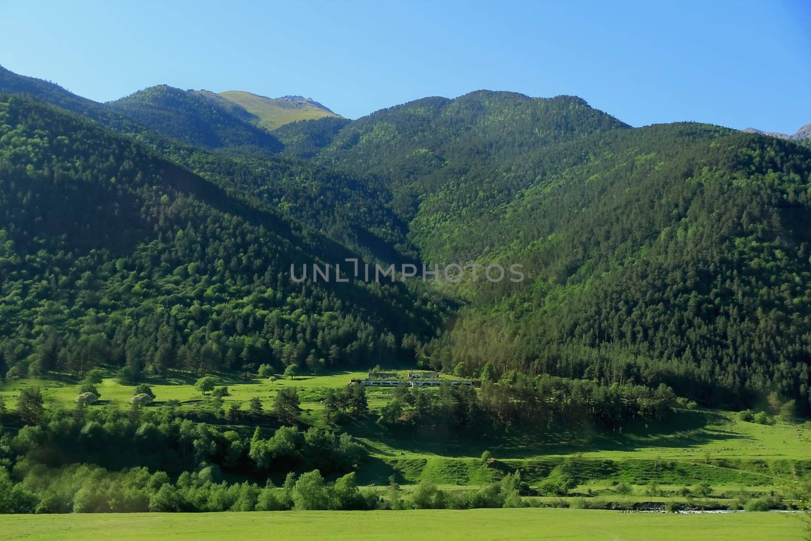 Image of summer landscape with Caucasus green mountains